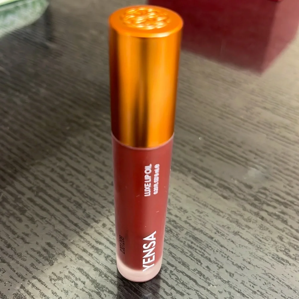 Yensa luxe lip oil in Boss Berry. NWOB.
